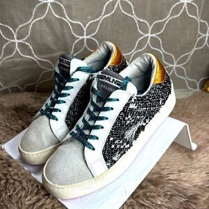 (E4) Meline Italy silver sequined leather sneakers, size 7 women.